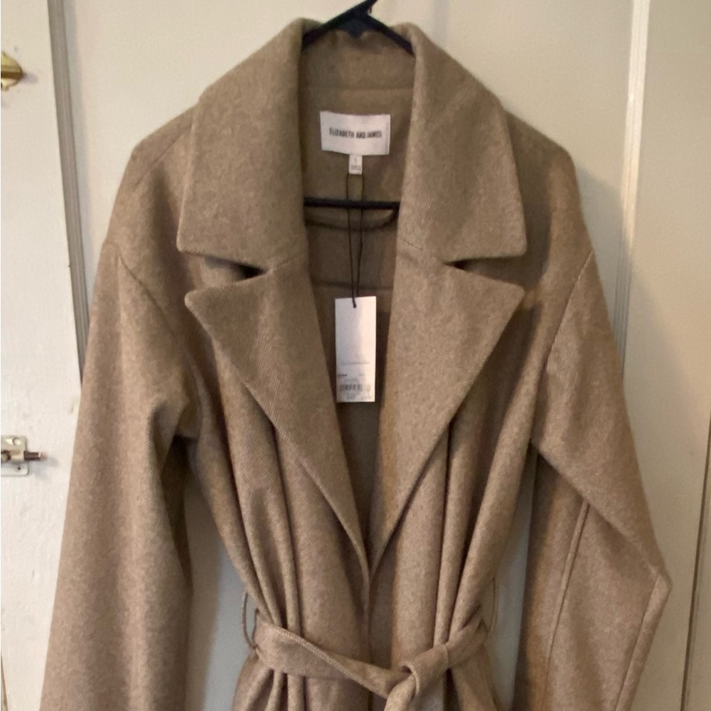 Elizabeth and James long coat. Side pockets, belted. No buttons.